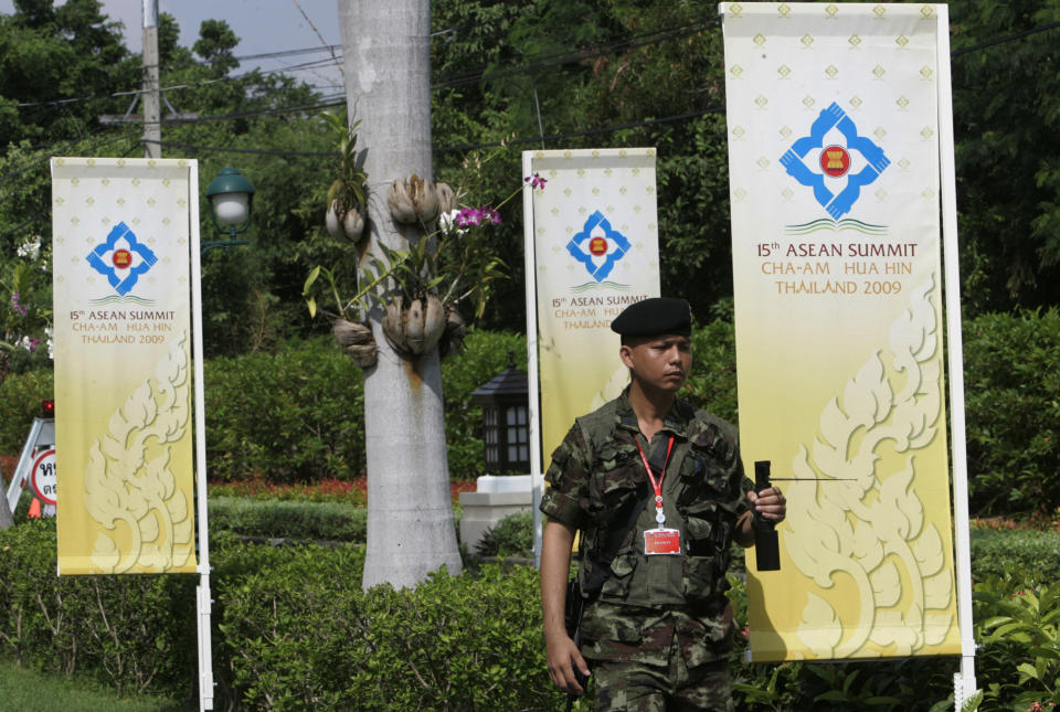 FILE - In this Thursday, Oct. 22, 2009, file photo, a soldier patrols with a mobile explosive detector GT 200 at a hotel in Cha-Am, a resort town in southern Thailand. Cha-Am is the venue for the 15th ASEAN Summit meeting. (AP Photo/Sakchai Lalit, File)