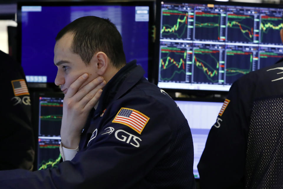 FILE - In this Jan. 9, 2020, file photo specialist Brian Giannettino works on the floor of the New York Stock Exchange. The U.S. stock market opens at 9:30 a.m. EST on Friday, Jan. 24. (AP Photo/Richard Drew, File)