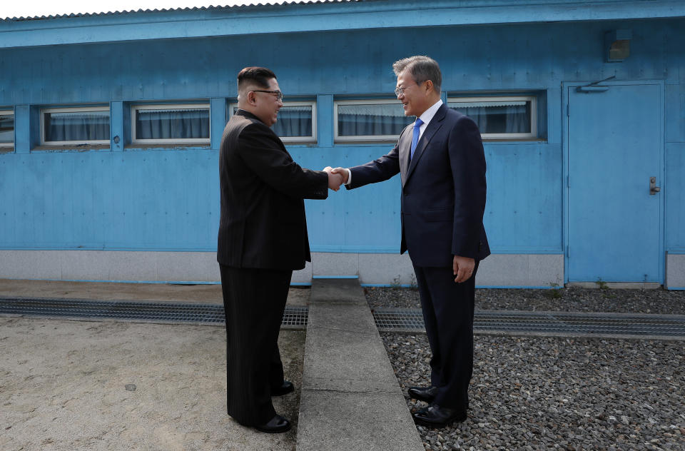 North Korean Leader Kim Jong Un and South Korean President Moon Jae-in shake hands over the military demarcation line during the Inter-Korean Summit on April 27, 2018, in Panmunjom, South Korea. (Photo: Inter Korean Press Corp/NurPhoto via Getty Images)