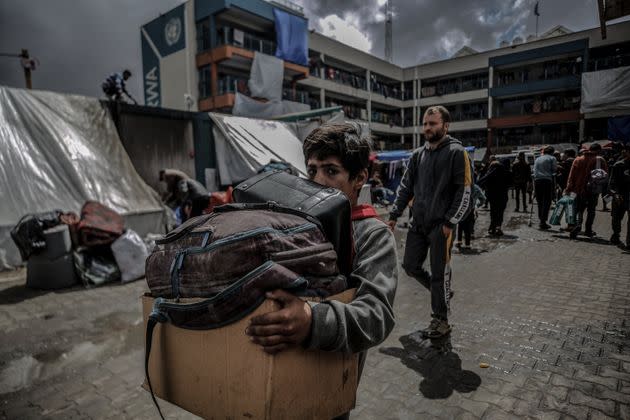 Hundreds of Palestinians, including children, migrate on Monday from eastern neighborhoods in the Gaza Strip after Israel warns them with pamphlets to evacuate Rafah.