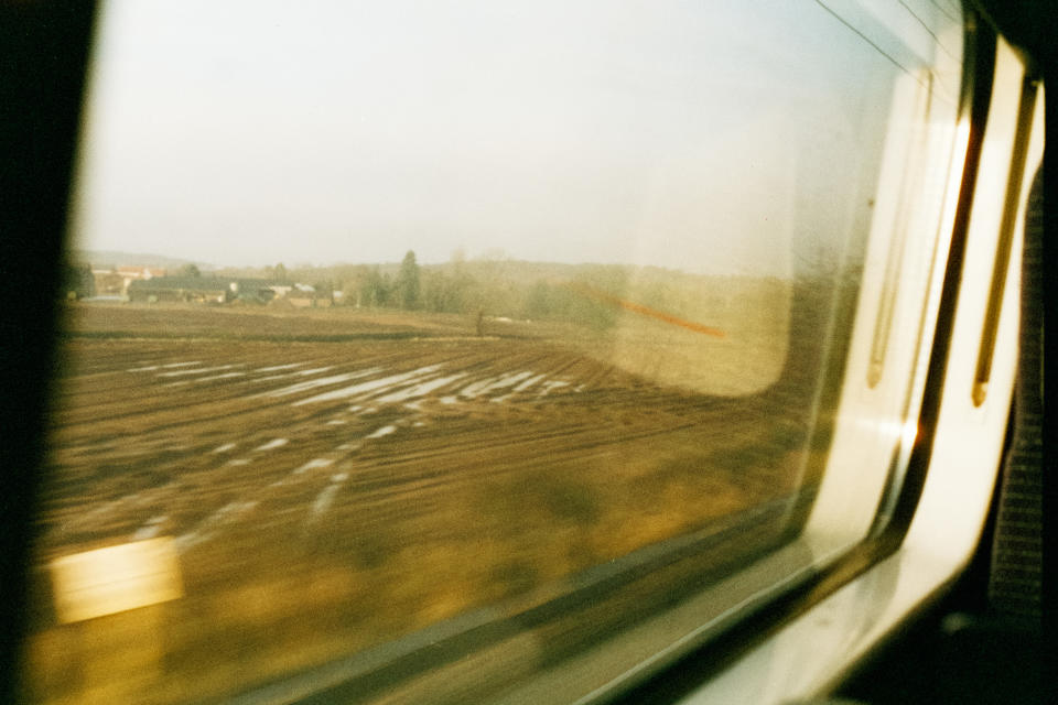 View out of a speeding train window taken on Harman Phoenix 200 35mm film