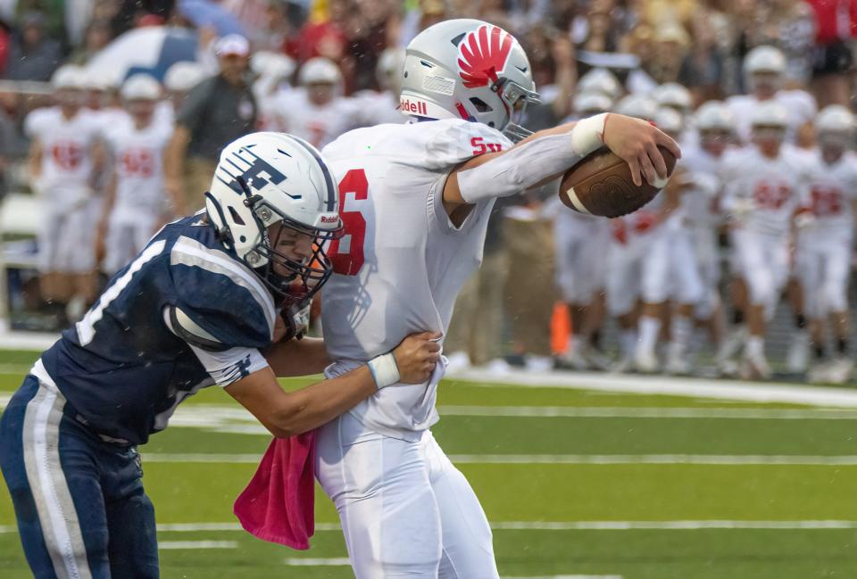 Sandy Valley's Chad Davis reaches for the goal line to score a touchdown during last week's game against Fairless.