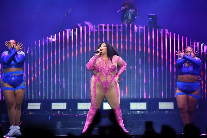 Lizzo wearing a pink leotard at concert in Toronto, Canada, on October 6, 2022.