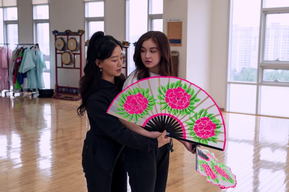 Kitty (Anna Cathcart) has a moment of bi panic as Yuri (Gia Kim) teaches her a dance routine.<span class="copyright">Park Young-Sol—Netflix</span>