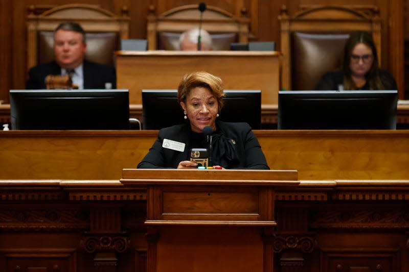 Georgia state Rep. Mesha Mainor, D-Atlanta, center, speaks in the House Chamber at the Georgia Capitol, March 6, 2023, in Atlanta.