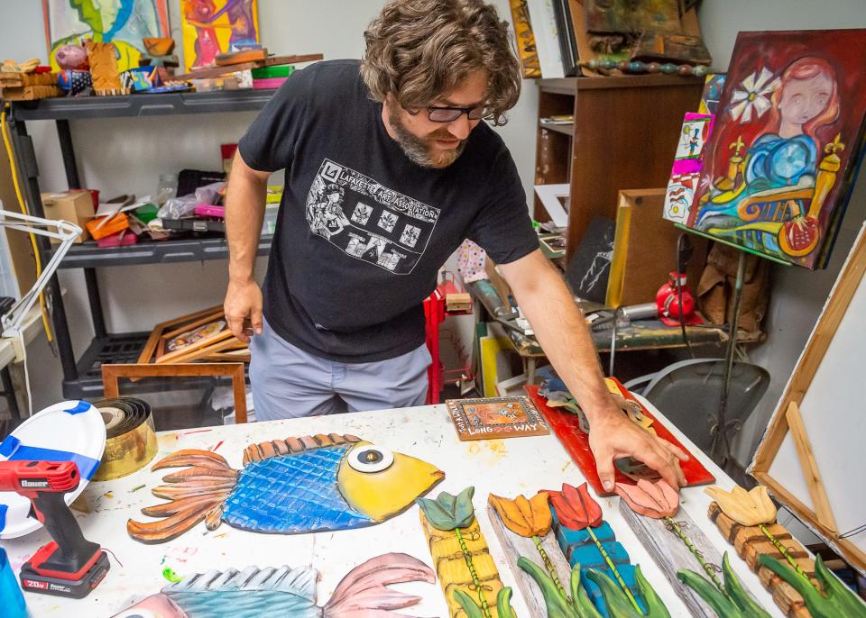 Dusty Reed is a self-taught artist from south Louisiana and known as "the Cajun Picasso." He has been creating art professionally for the past 15 years, including paintings and sculptures to multidimensional installations. Wednesday, June 29, 2022.