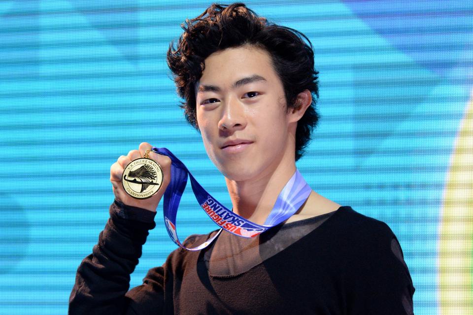 Nathan Chen poses with his medal at the 2021 U.S. Figure Skating Championships.