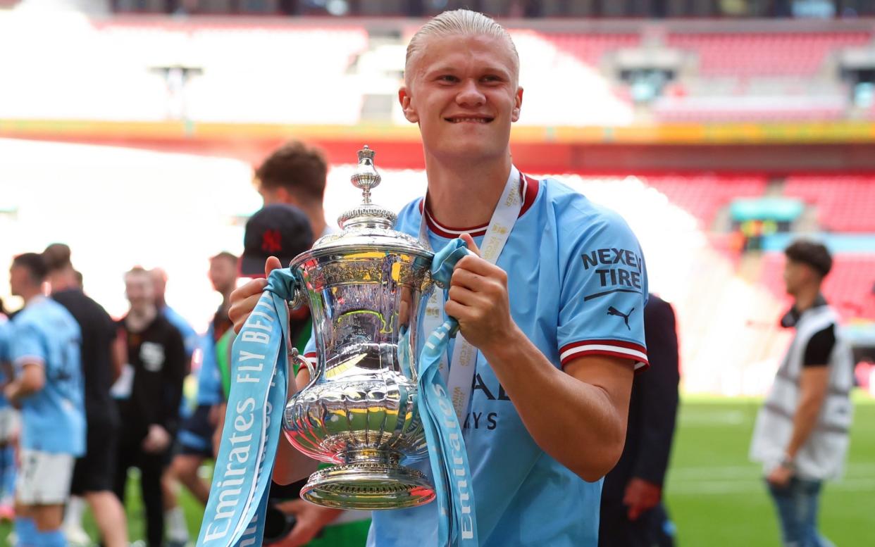 Erling Haaland with the FA Cup trophy