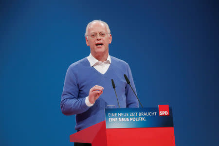 Former SPD leader Rudolf Scharping speaks during the SPD's one-day party congress in Bonn, Germany, January 21, 2018. REUTERS/Wolfgang Rattay