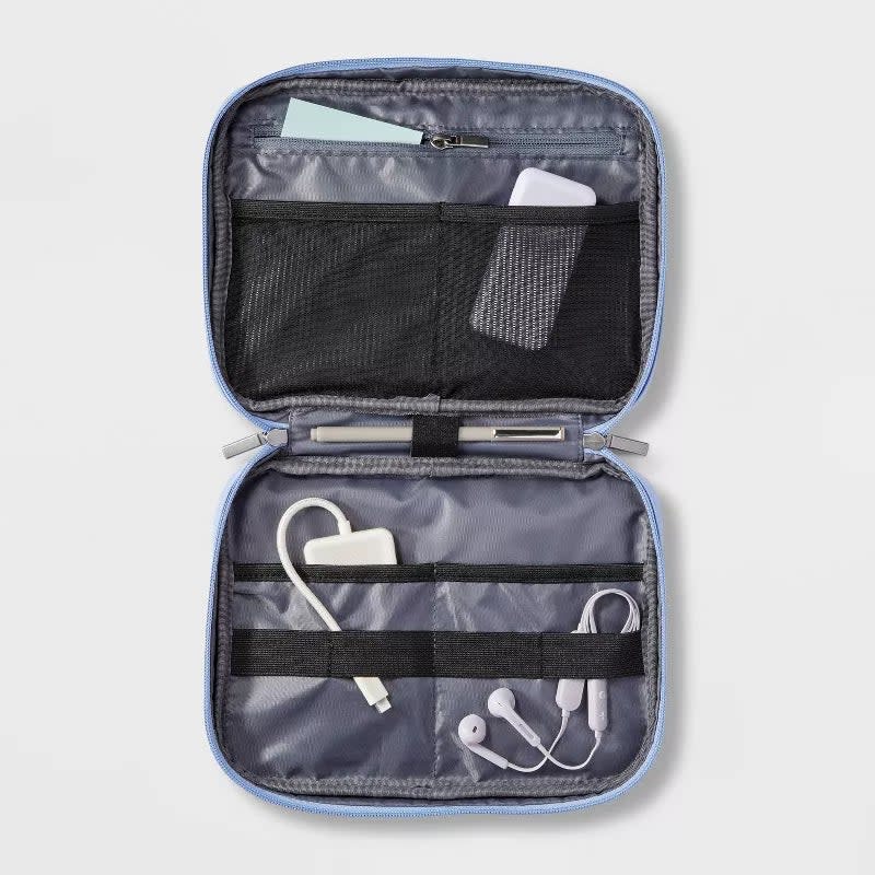 The cable organizer pouch, open to display its contents