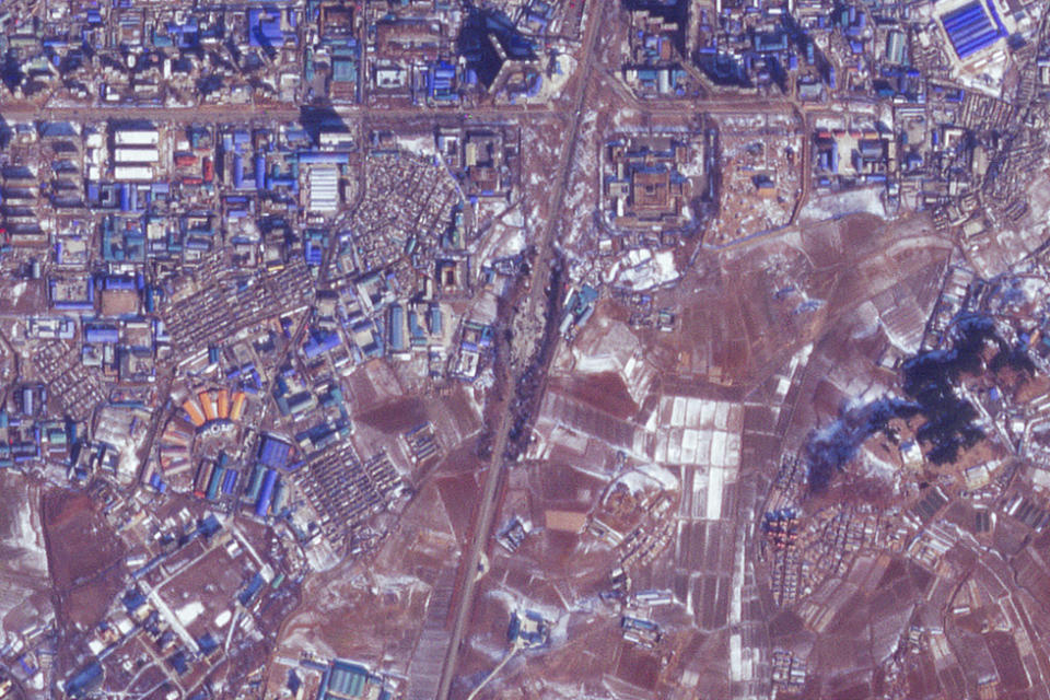 This satellite image from Planet Labs PBC appears to show the Pyongyang's Monument to the Three Charters for National Reunification, which was also commonly called the Arch of Reunification, destroyed in Pyongyang, North Korea, Tuesday, Jan. 23, 2024. The monument appears to have been destroyed as tensions on the Korean Peninsula have increased in recent months and as North Korean leader Kim Jong Un called the monument an "eyesore." (Planet Labs PBC via AP)