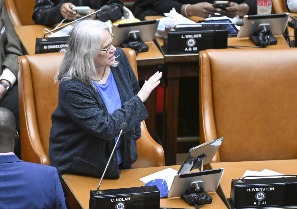 Assemblywoman Helene E. Weinstein, D-Brooklyn, debates legislation to approve a legislative pay raise during a special legislative session in the Assembly Chamber at the state Capitol, Thursday, Dec. 22, 2022, in Albany, N.Y. (AP Photo/Hans Pennink)