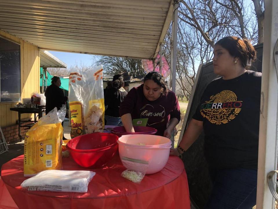 Members of the Kerman community sell tamales, mole and pozole Sunday, Feb. 25, to raise money for three of the victims in a fatal crash in Madera that killed eight people.