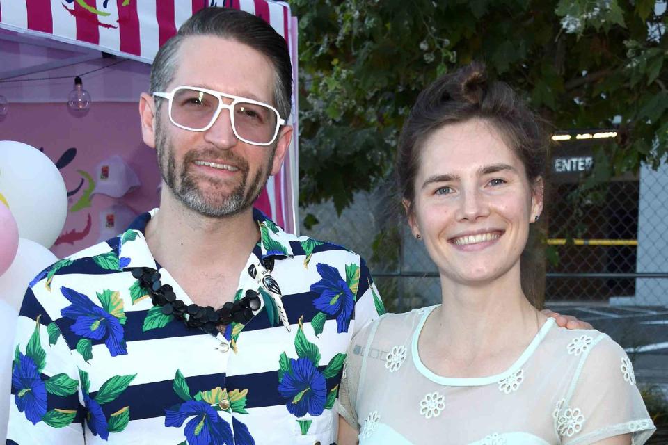 <p>Gregg DeGuire/Getty</p> Amanda Knox and husband Christopher Robinson