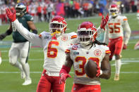 Kansas City Chiefs linebacker Nick Bolton (32) celebrates after scoring a touchdown after recovering a fumble by Philadelphia Eagles quarterback Jalen Hurts (1) during the first half of the NFL Super Bowl 57 football game between the Kansas City Chiefs and the Philadelphia Eagles, Sunday, Feb. 12, 2023, in Glendale, Ariz. (AP Photo/Ross D. Franklin)