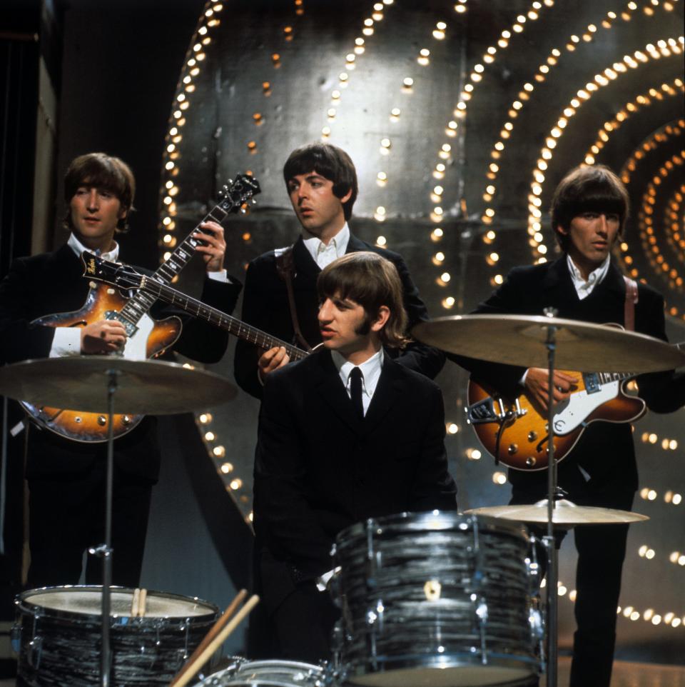 The Beatles performing on “Top of The Pops”, 16 June 1966.