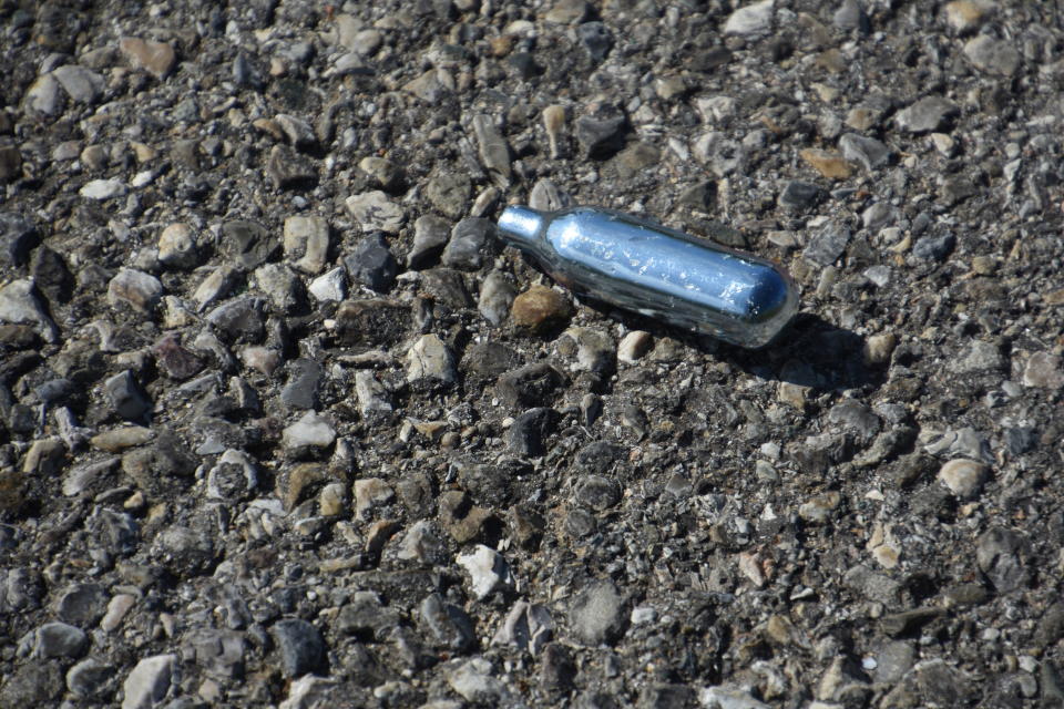 MARSEILLE, FRANCE - 2020/05/25: A metallic nitrous oxide cartridge is seen thrown on the ground.
Nitrous oxide, nicknamed 