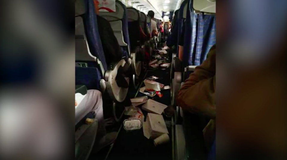 The aisle was seen littered with rubbish after a few seconds of free falling, passengers said. Source: Newsflare