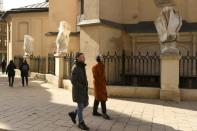 In Lviv, many statues have been swaddled in fabric or boxed off out of view (AFP/Yuriy Dyachyshyn)