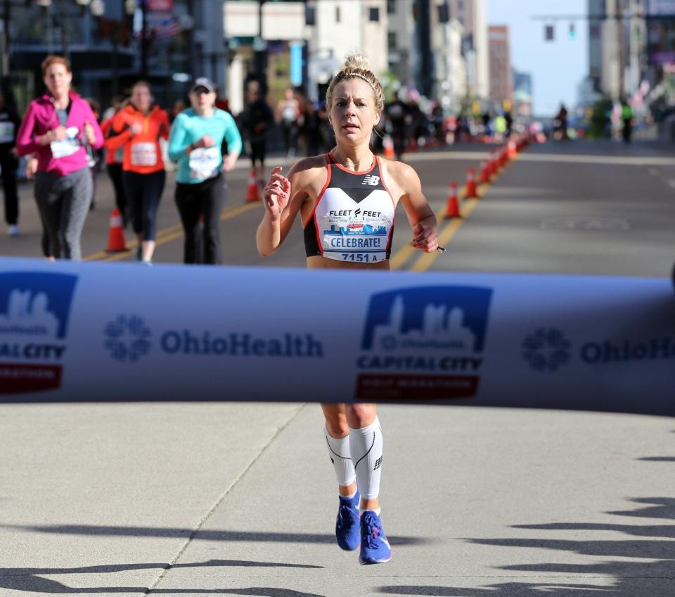 Molly Bookmyer finishes first in the female category of the Capital City Half Marathon in Columbus in 2019.