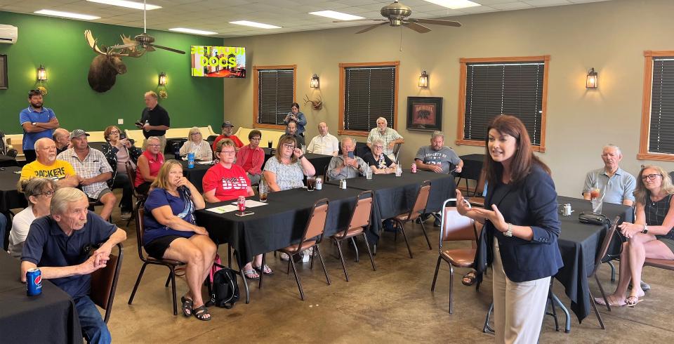 Former Wisconsin Lt. Gov. Rebecca Kleefisch speaks to Oconto County residents in a campaign stop at Irish Greens Golf Course in Oconto on July 19. She is seeking the GOP nomination for governor in the Aug. 9 primary.