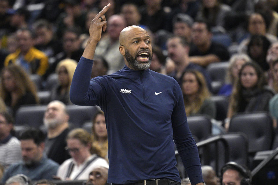 Orlando Magic head coach Jamahl Mosley calls instructions during the first half of an NBA basketball game against the Phoenix Suns, Sunday, Jan. 28, 2024, in Orlando, Fla. (AP Photo/Phelan M. Ebenhack)