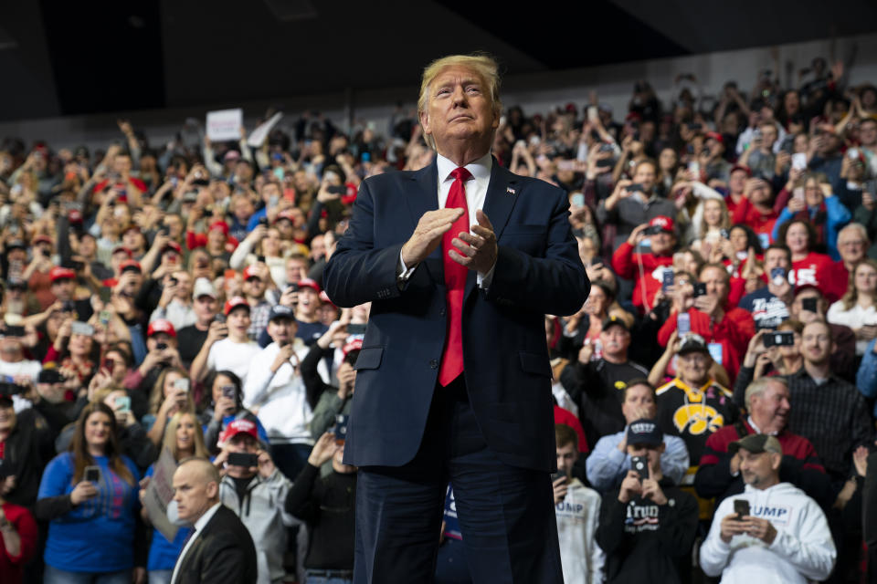 FILE - President Donald Trump arrives to speak at a campaign rally at the Knapp Center on the campus of Drake University, Jan. 30, 2020, in Des Moines, Iowa. Republican presidential prospects are streaming into Iowa, the leadoff presidential caucus state. Notably absent from the lineup, at least for now, is former President Donald Trump who carried the state twice, by healthy margins, as the Republican presidential nominee in the 2016 and 2020 elections. (AP Photo/ Evan Vucci, File)