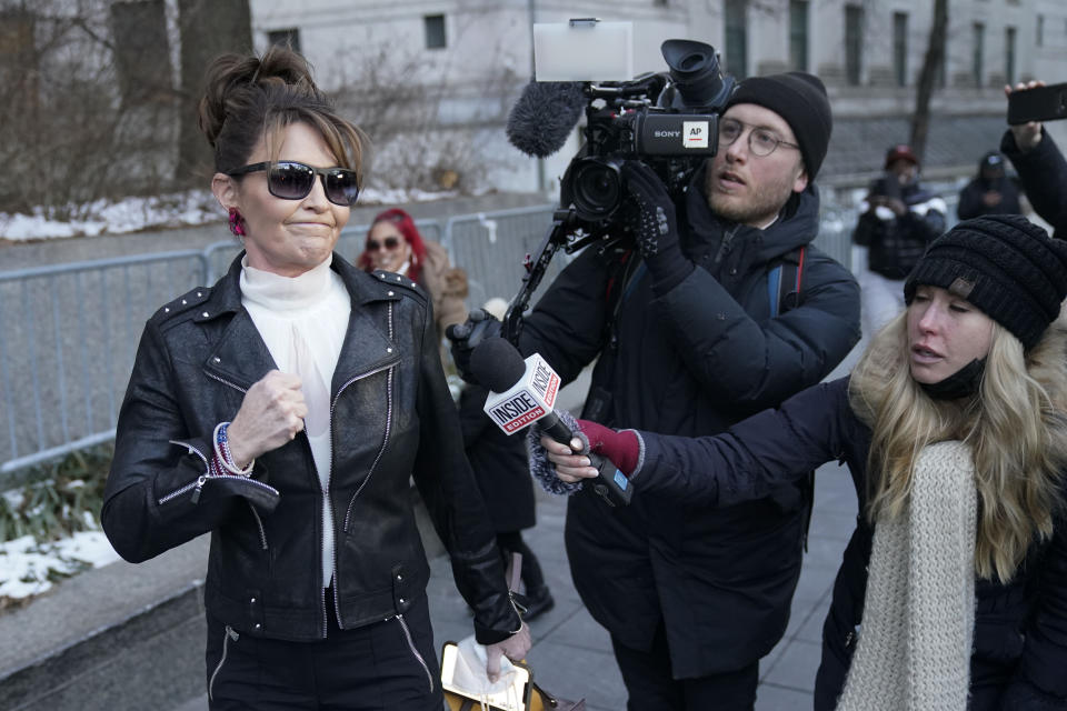 Former Alaska Gov. Sarah Palin reacts leaves a courthouse in New York, Monday, Feb. 14, 2022. A judge said Monday he’ll dismiss a libel lawsuit that Palin filed against The New York Times, claiming the newspaper damaged her reputation with an editorial falsely linking her campaign rhetoric to a mass shooting. U.S. District Judge Jed Rakoff made the ruling with a jury still deliberating at a New York City trial where the former Alaska governor and vice-presidential candidate testified last week. (AP Photo/Seth Wenig)