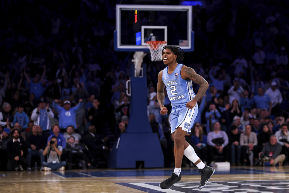North Carolina guard Caleb Love reacts during the second half of an NCAA college basketball game against Ohio State in the CBS Sports Classic, Saturday, Dec. 17, 2022, in New York. The Tar Heels won 89-84 in overtime. (AP Photo/Julia Nikhinson)