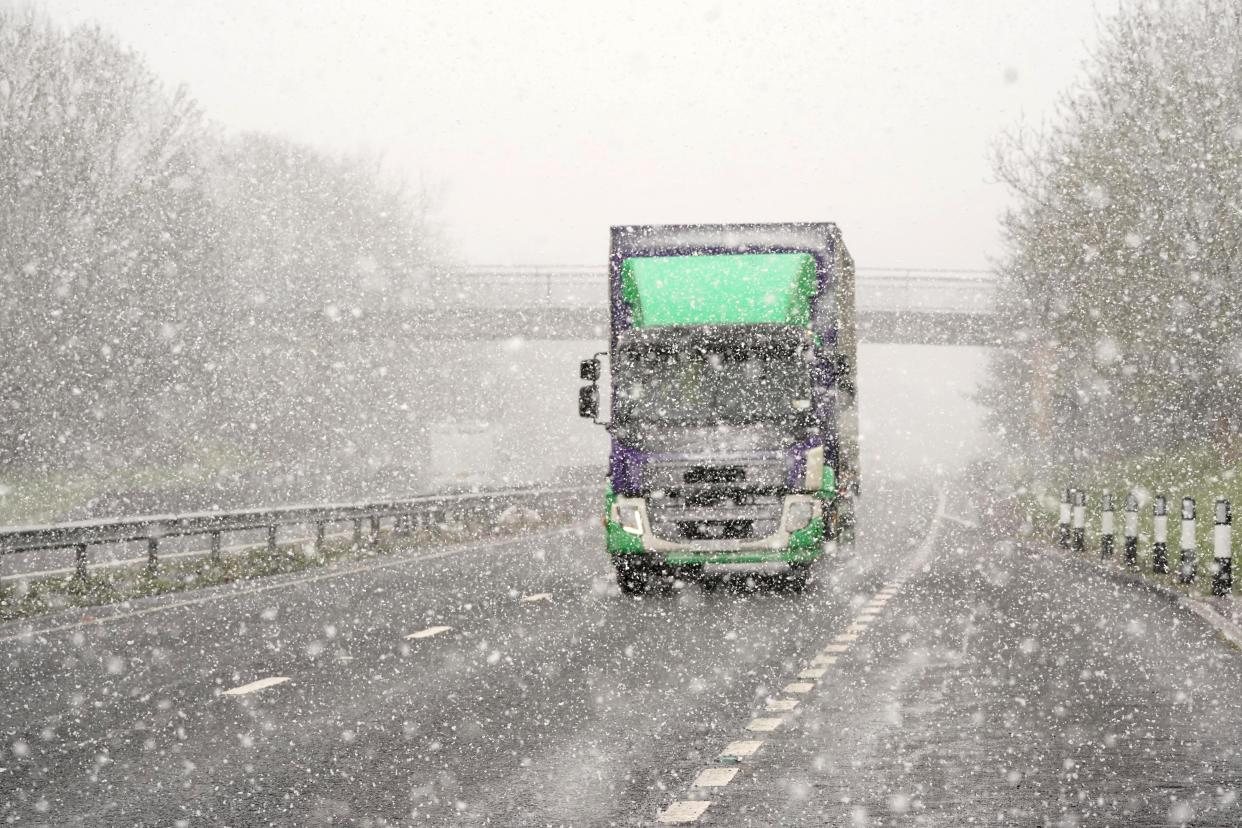 A lorry in snowy conditions on the A69 near Newcastle (PA Wire)