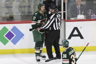 Minnesota Wild left wing Marcus Foligno (17) reacts after being called for tripping during the third period of Game 4 of an NHL hockey Stanley Cup first-round playoff series against the Dallas Stars, Sunday, April 23, 2023, in St. Paul, Minn. (AP Photo/Stacy Bengs)