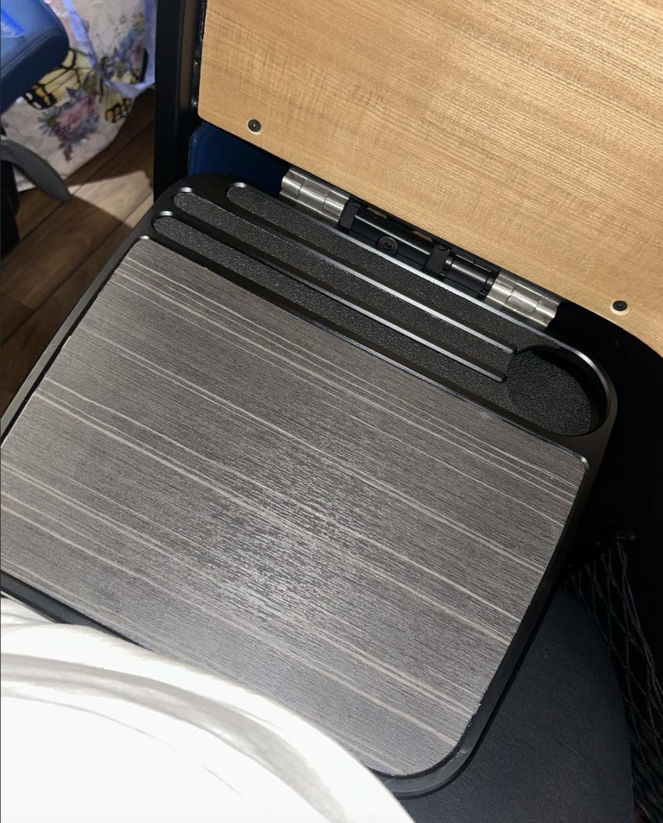 tray table that folds with cup holder