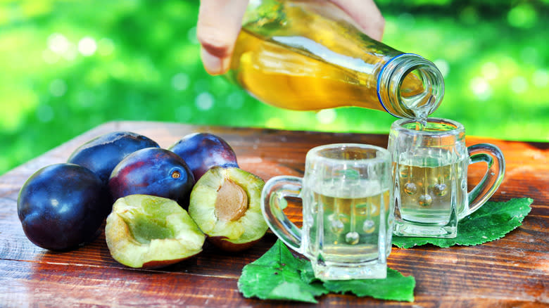 pouring unmarked plum rakia