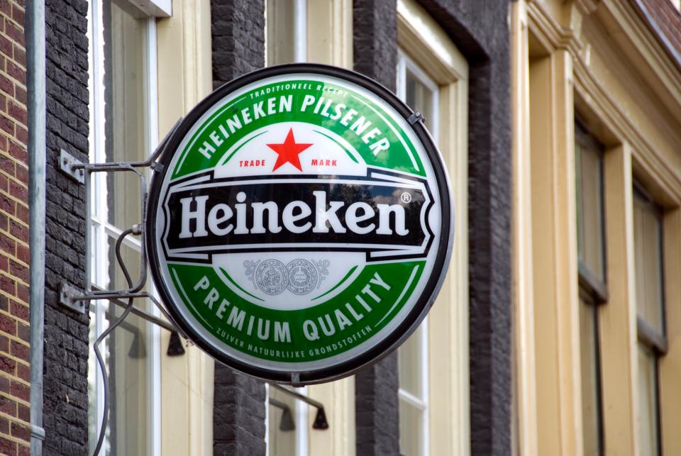 <p>The Dutch brewer said it will axe almost 10 per cent of its 85,000 staff as part of its efforts to save £1.75bn</p> (Getty)