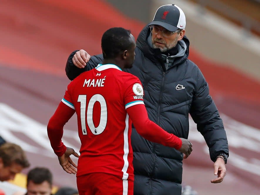 <p>Liverpool manager Jurgen Klopp with Sadio Mane</p> (POOL/AFP via Getty Images)