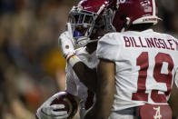 Alabama wide receiver Ja'Corey Brooks (7) reacts to the Auburn crowd after he scored a touchdown on the final drive of regulation during the second half of an NCAA college football game, Saturday, Nov. 27, 2021, in Auburn, Ala. (AP Photo/Vasha Hunt)