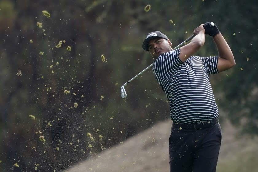 Sebastian Munoz hits from the 18th fairway during the first round of the Zozo Championship golf tournament Thursday, Oct. 22, 2020, in Thousand Oaks, Calif. (AP Photo/Marcio Jose Sanchez)