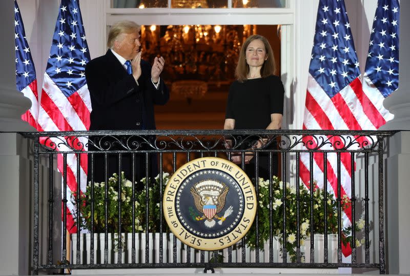 Judge Amy Coney is sworn in as an associate justice of the U.S. Supreme Court at the White House in Washington