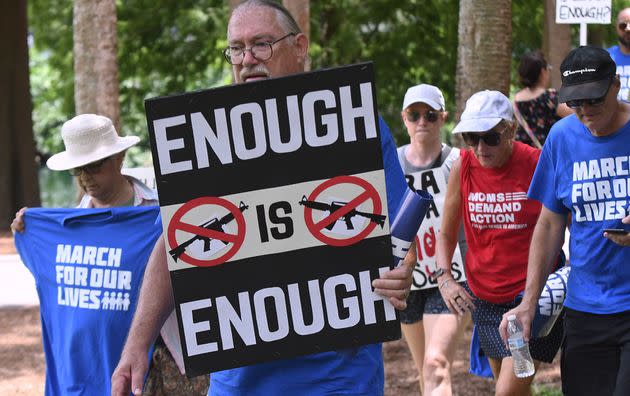 Gun safety advocates participate in the March for Our Lives rally in downtown Orlando on June 11, 2022. Similar marches have been held across the U.S. in the wake of recent mass shootings.