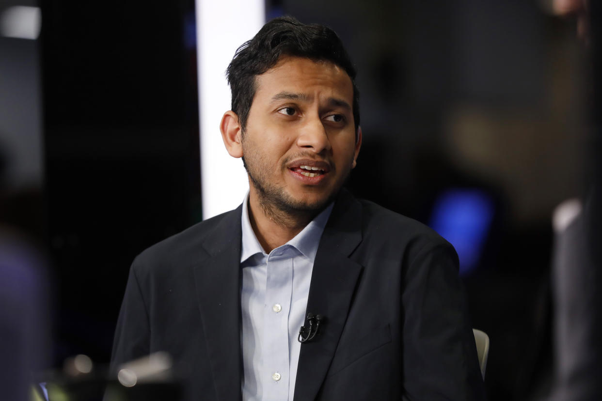 Ritesh Agarwal, founder and CEO of OYO Rooms, is interviewed on the floor of the New York Stock Exchange, Tuesday, Feb. 18, 2020. (AP Photo/Richard Drew)