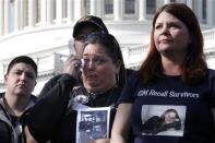 (L-R) Crash survivor Samantha Denti and grieving mothers Kim Langley and Laura Christian join fellow family members of victims of the GM recall failure for a news conference on the U.S. Capitol grounds in Washington April 1, 2014. REUTERS/Jonathan Ernst