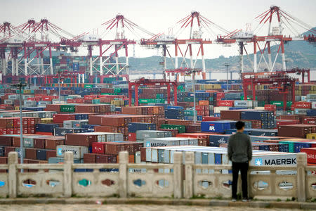 FILE PHOTO: Containers are seen at the Yangshan Deep Water Port in Shanghai, China April 24, 2018. REUTERS/Aly Song/File Photo