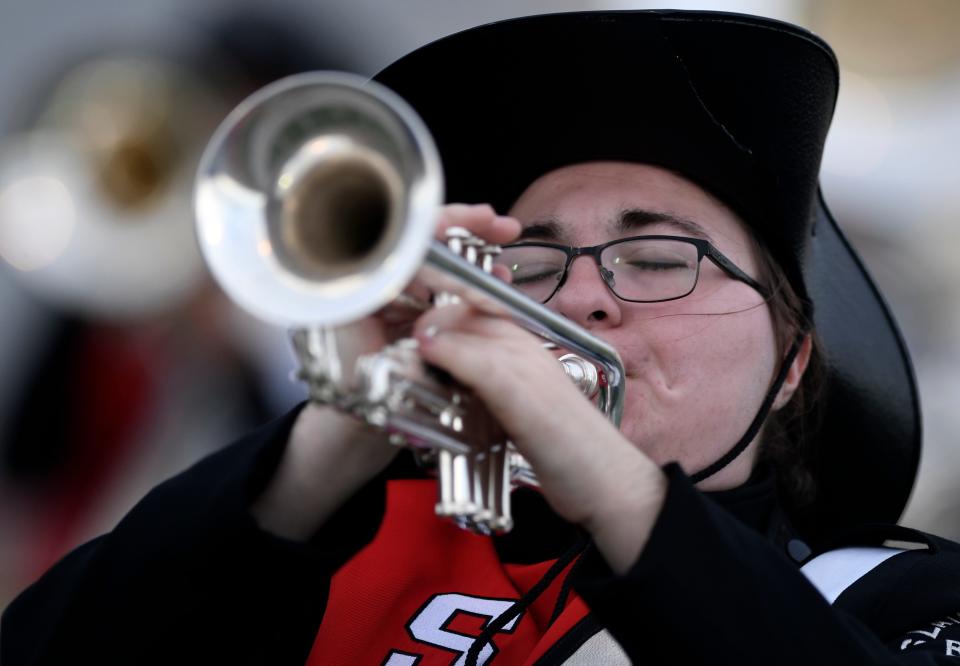 Slaton's Rachel Miers plays trumpet during the 3A UIL Region 16 marching contest on Oct. 15 at PlainsCapital Park. Slaton received a Division 2 rating.