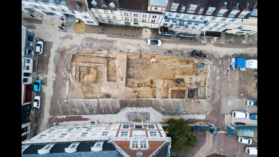 A fortified structure was found under the ground of the courtyard and included homes, hearths and cellars, researchers said.
