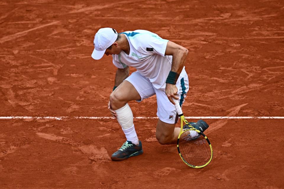 Facundo Bagnis, pictured here clearly injured against Daniil Medvedev at the French Open.