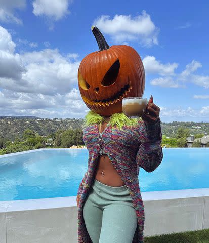 Megan Thee Stallion Gets into Halloween Spirit with Pumpkin Mask