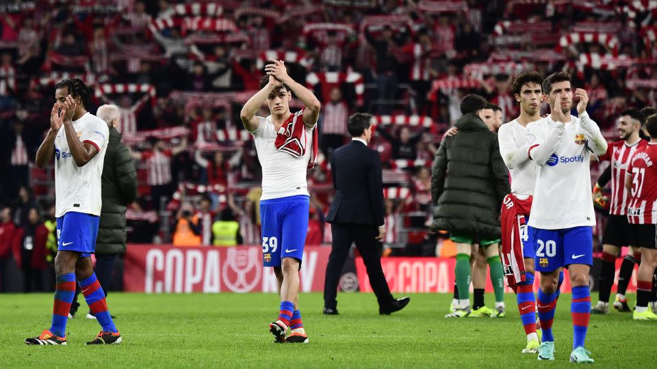 Barcelona players applaud their fans after the game. - Ander Gillenea/AFP/Getty Images