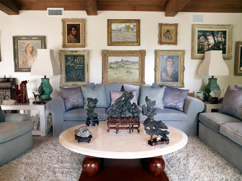 <p>An additional view of the living room with various pieces from Taylor’s art collection.</p>