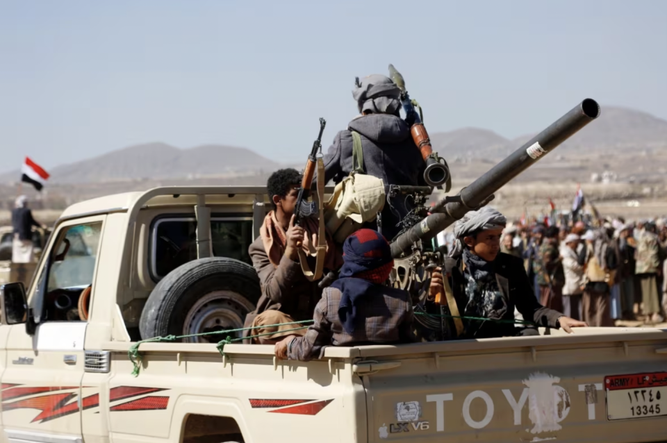 Houthi fighters and tribesmen stage a rally near Sanaa, Yemen, on Sunday, Jan. 14, 2024. (The Associated Press)