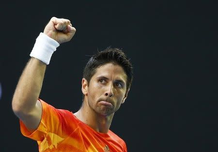 Spain's Fernando Verdasco celebrates after winning his first round match against Spain's Rafael Nadal at the Australian Open tennis tournament at Melbourne Park, Australia, January 19, 2016. REUTERS/Thomas Peter